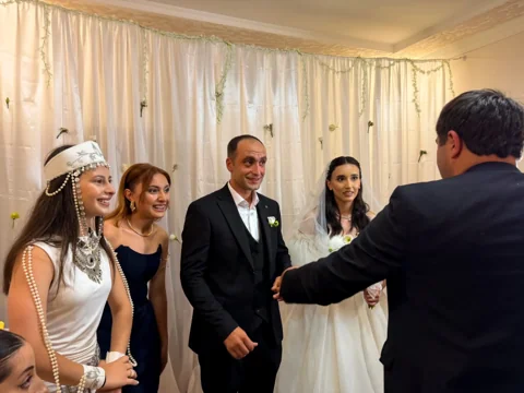 A local family celebrating an Armenian wedding
